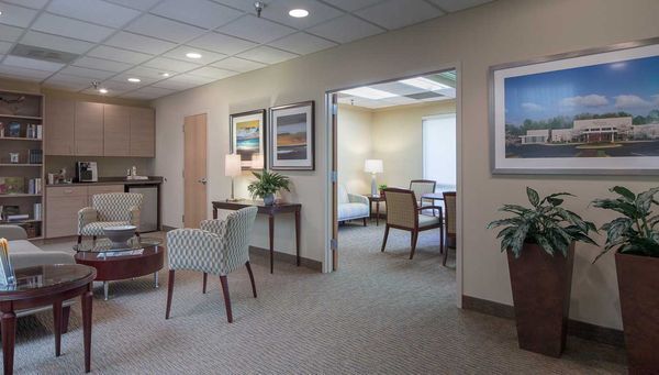 Reception area with bereavement lending library: Columbia Arrangement Center
