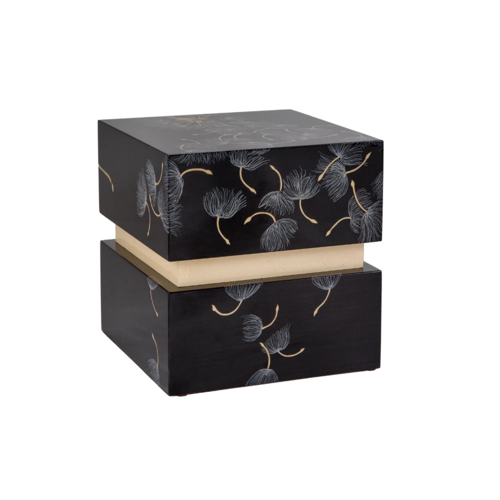 Dark wood urn with a dandelion pattern and a light wood accent