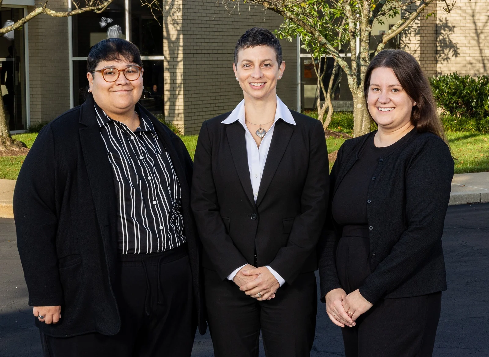 Our three Advance Planning team members standing together outside Sol Levinson.